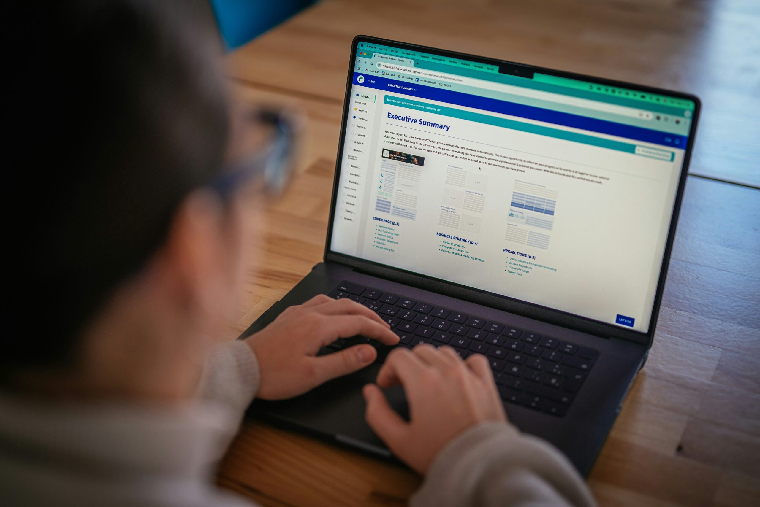 A person looking at a phishing email on their computer screen