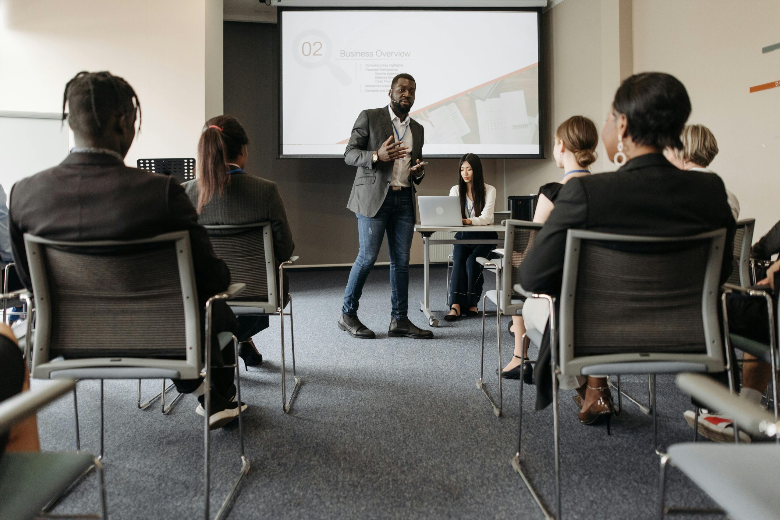 Group of employees participating in cybersecurity awareness seminar