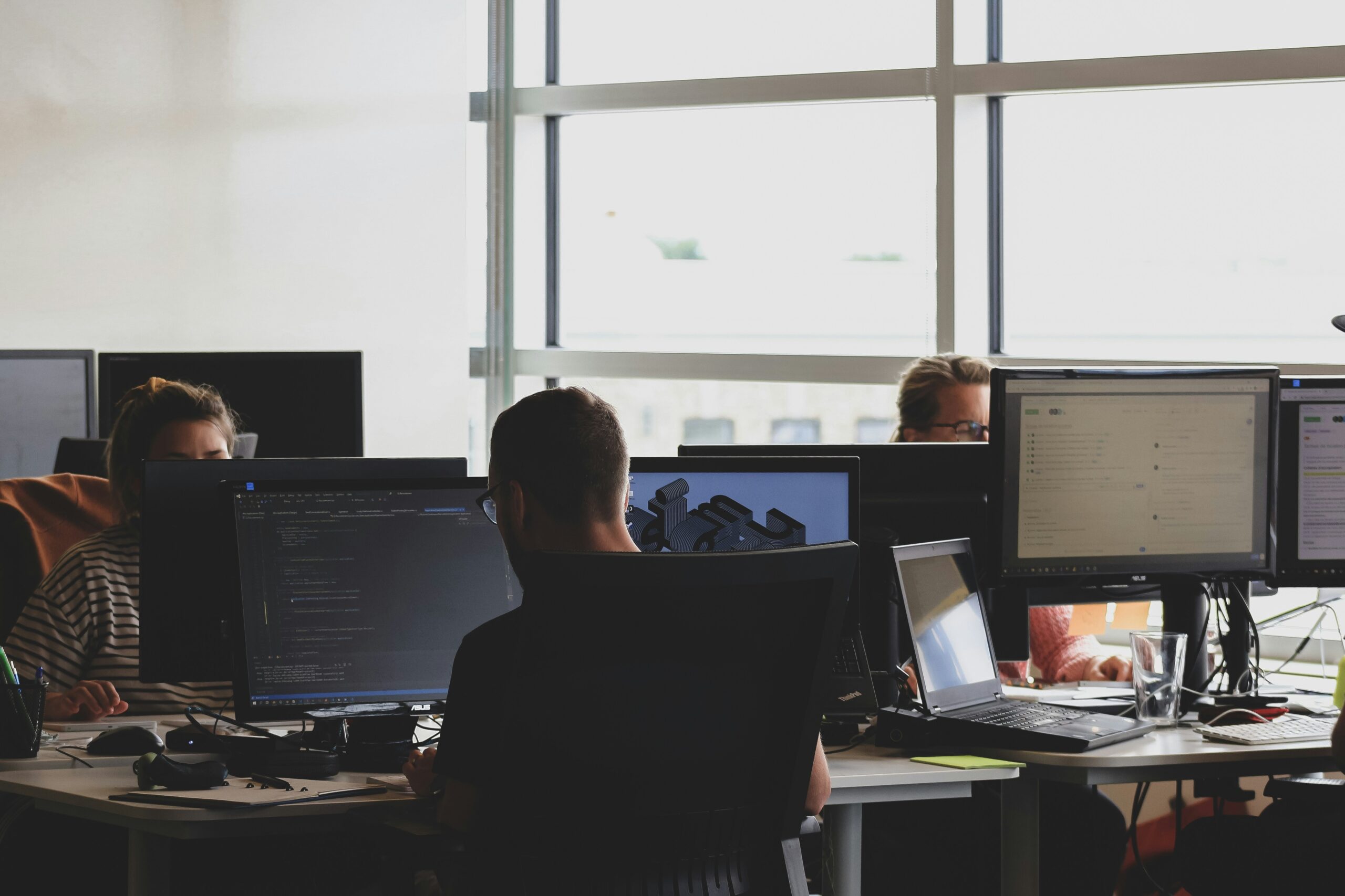 Photo of team members undergoing cybersecurity training in an office setting